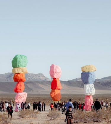 Seven colored stone pillars representing the best employee onboarding learning management systems of 2024